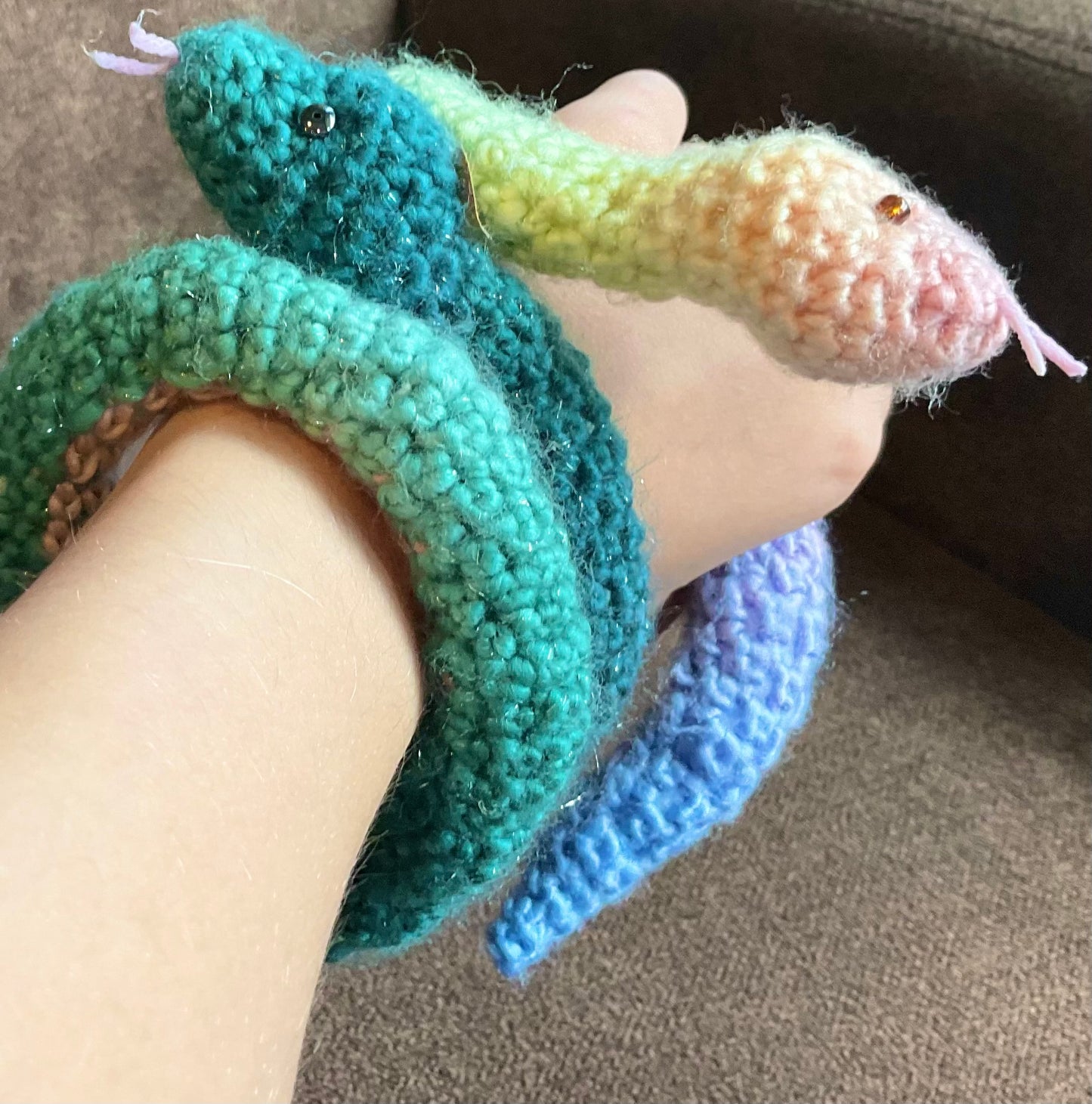 Crochet rainbow snake. Hand made crochet toy, cute, cheerful, Halloween decor