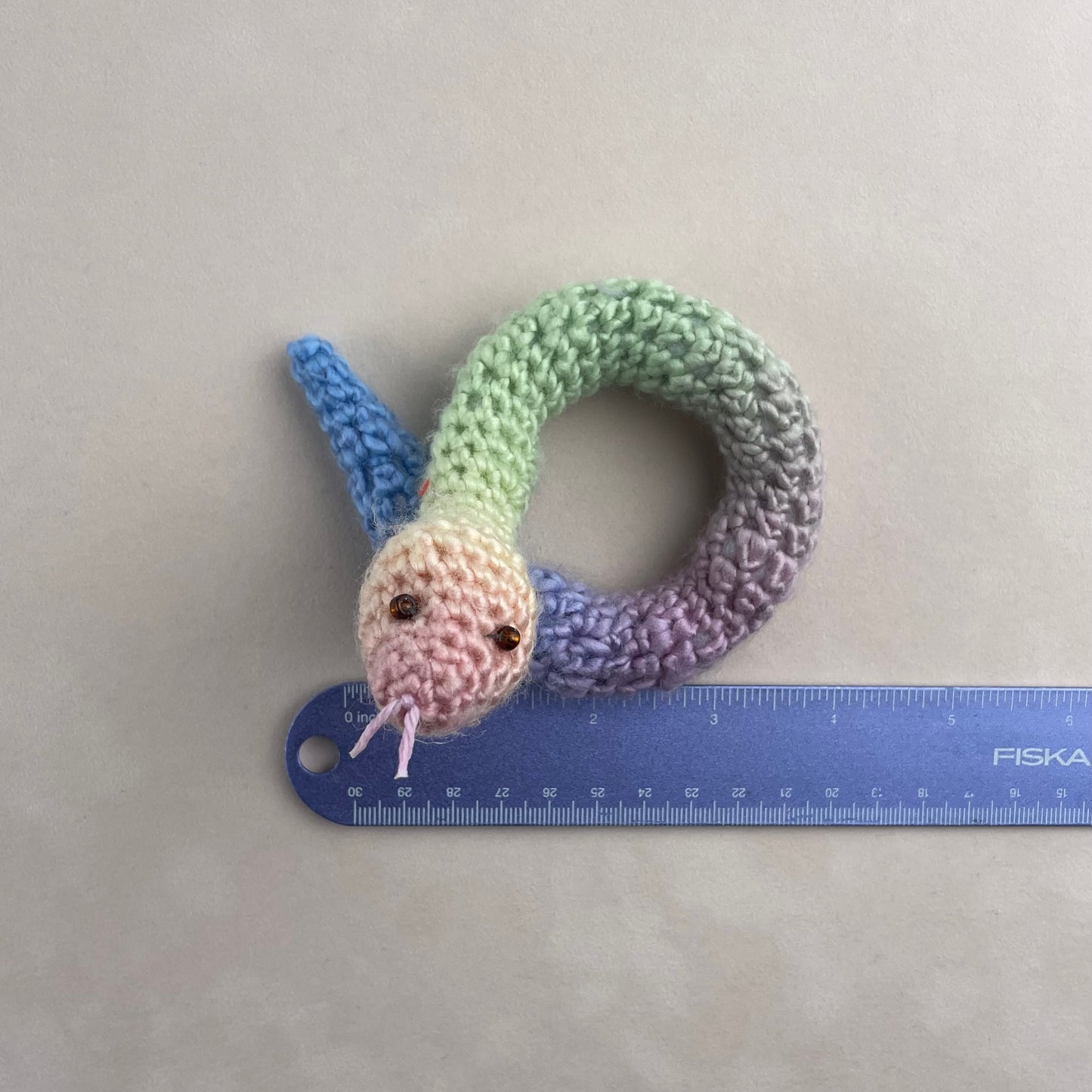 Crochet rainbow snake. Hand made crochet toy, cute, cheerful, Halloween decor