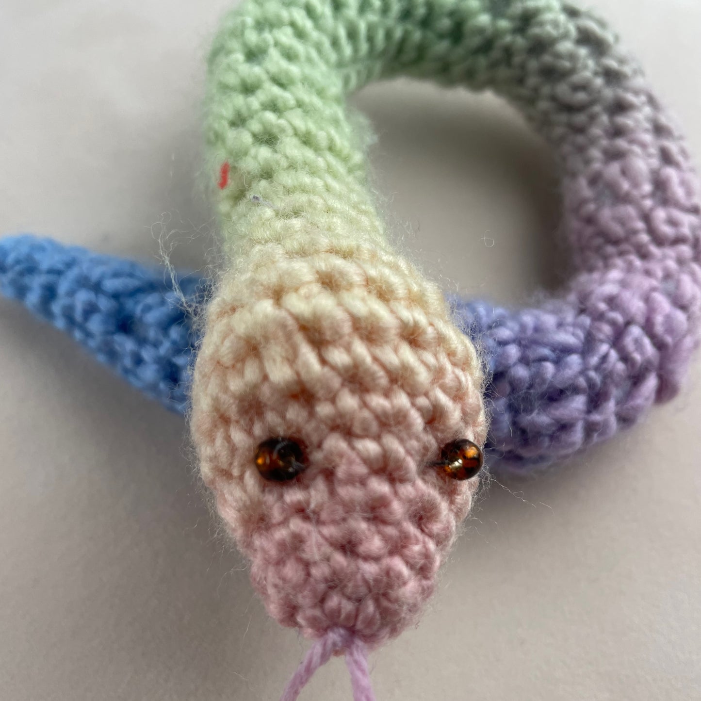 Crochet rainbow snake. Hand made crochet toy, cute, cheerful, Halloween decor