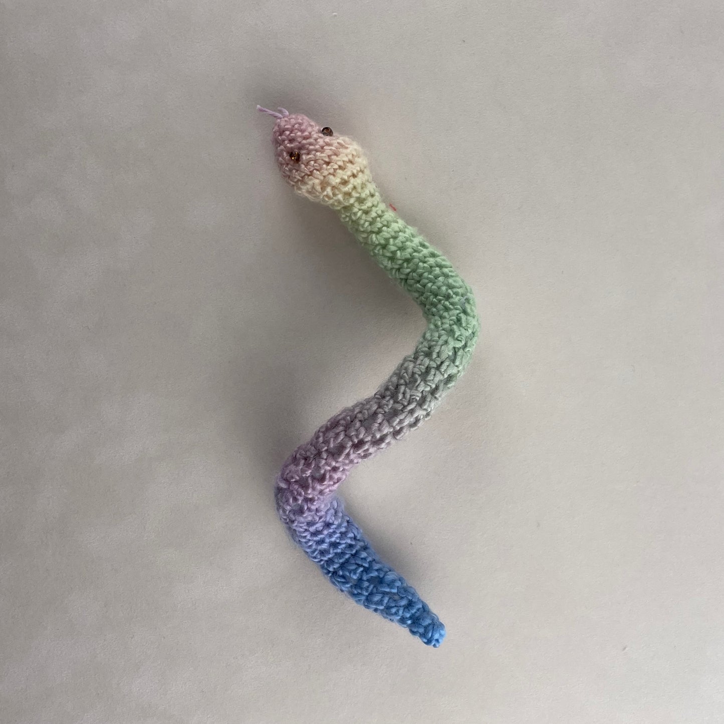 Crochet rainbow snake. Hand made crochet toy, cute, cheerful, Halloween decor