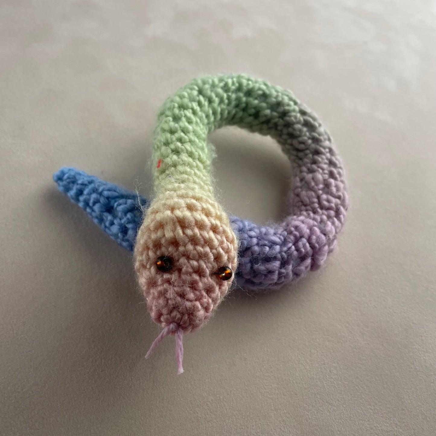 Crochet rainbow snake. Hand made crochet toy, cute, cheerful, Halloween decor